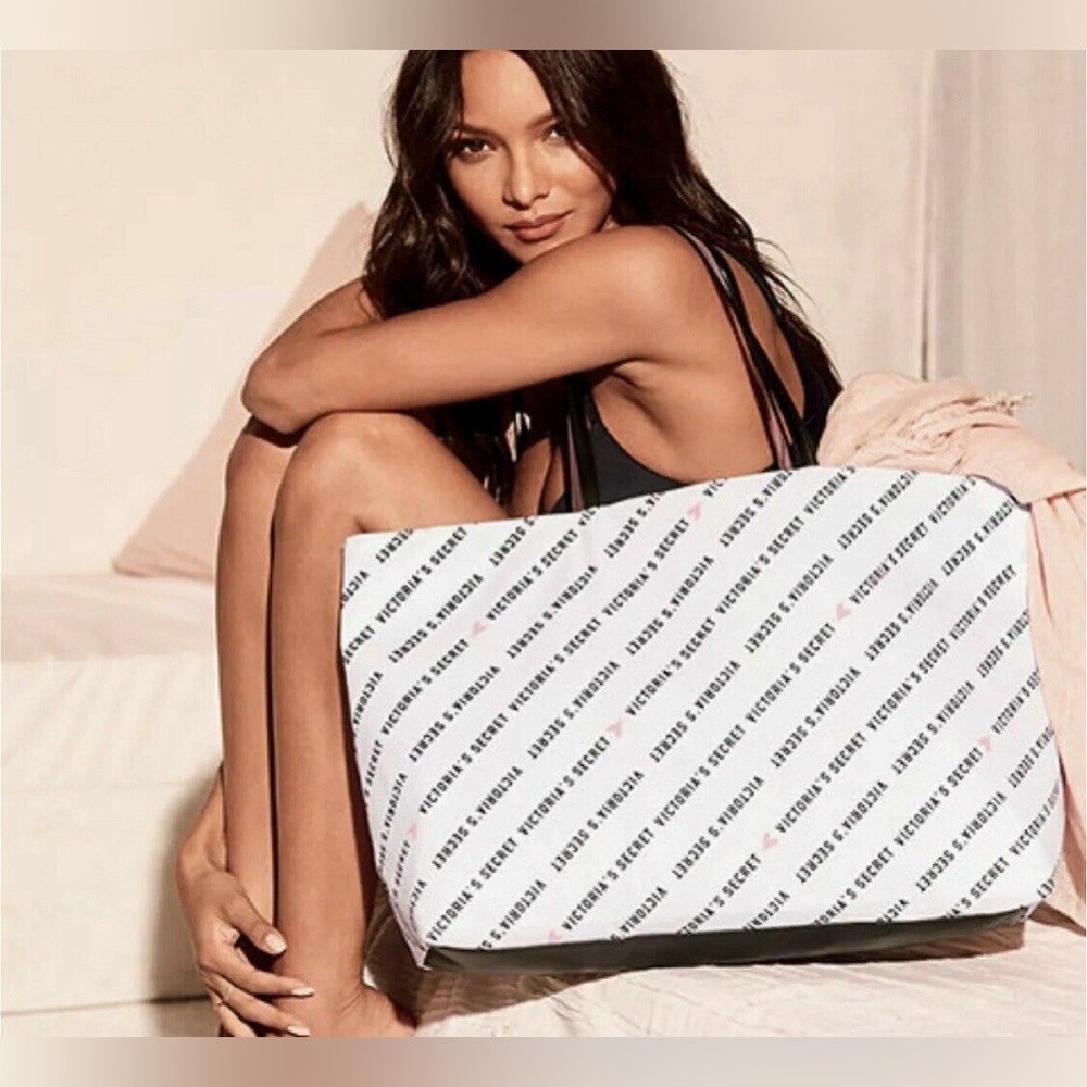 Victoria’s Secret white with black “Victoria’s Secret” tote with hearts